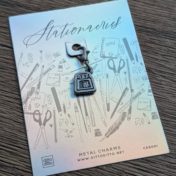 metal charm - ink